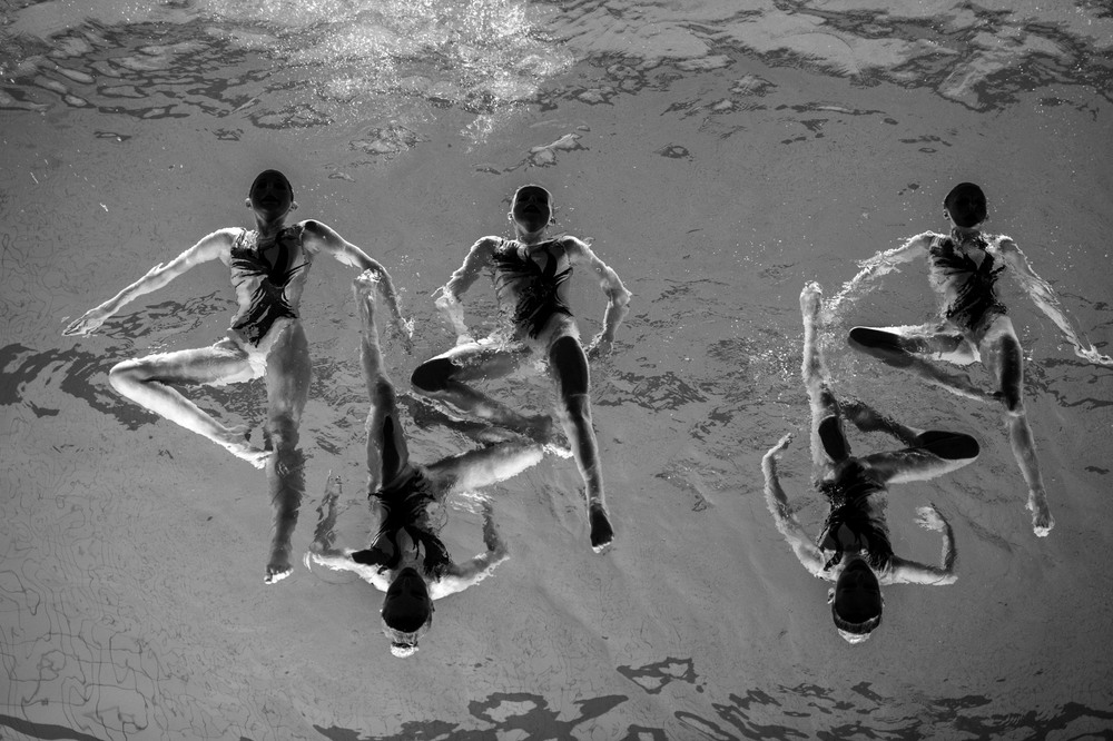 Sports category 3rd place. Members of the Neptun Synchro synchronized swimming team perform during a Christmas show in Stockholm, Sweden.