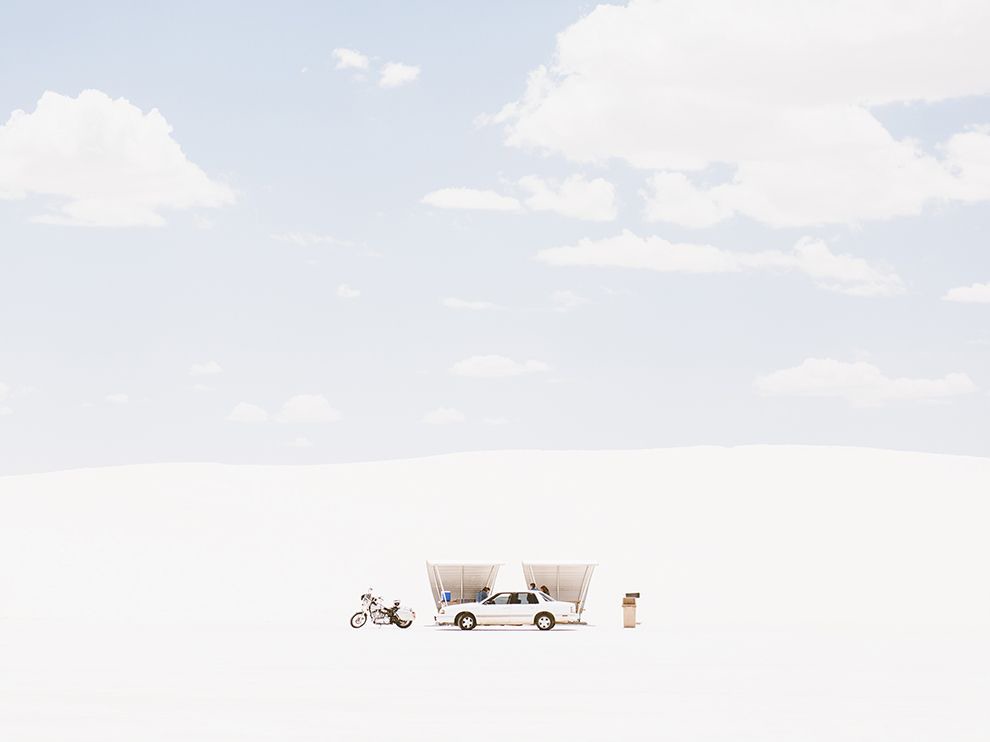 16 White Hot. Photograph by Elliot Ross.    “On a sun-bleached afternoon cresting 100ºF at White Sands National Monument [in New Mexico], I was making my way to the only shade visible,” writes Your Shot member Elliot Ross. “As I approached, out of nowhere these travelers rounded a dune and beat me to it. My frustration melted when I saw how perfectly symmetrical their vehicles made my frame. I took a dozen steps back to highlight the immensity of this surreal landscape. After a few frames, I was on my way to find new shelter.”