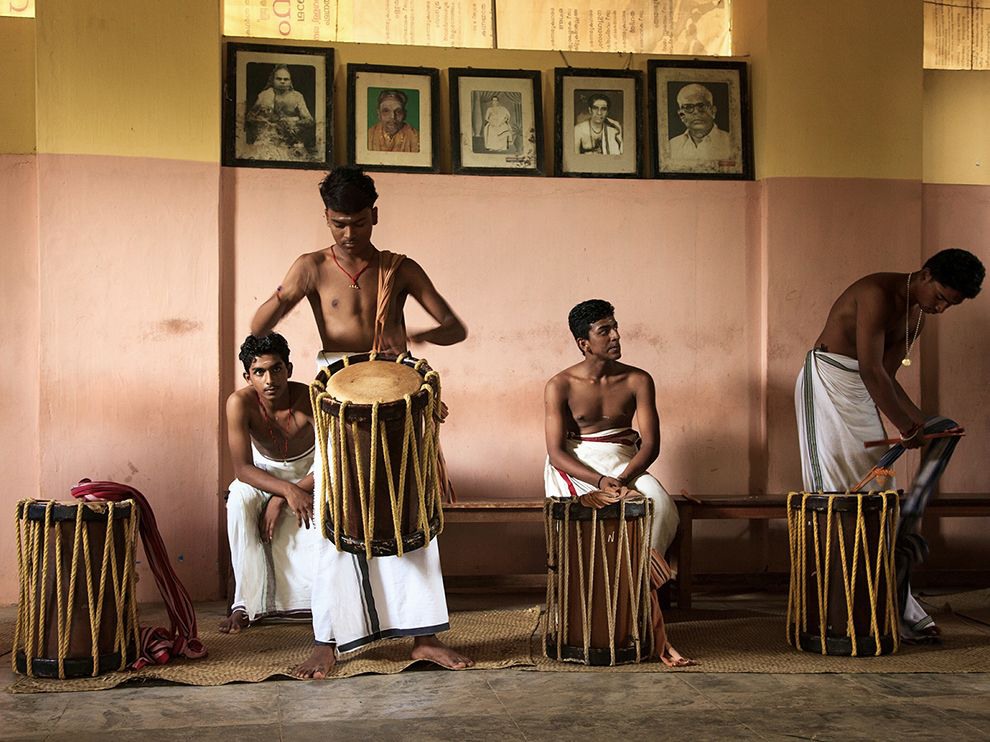 16 Beat the Drum. Photograph by Prasad Perakam. Students study the chenda, or wooden drum, at India’s Kerala Kalamandalam, a famous art and culture school. “After a while [the] teacher asked them to take a break, but one student was continuing his practice,” says photographer Prasad Perakam. “That showed me his passion and dedication to this art.”