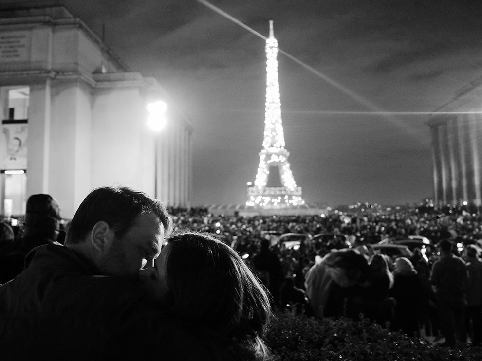 25 Romance in a Crowd. Photograph by Chenkun Long. Few cities are more romanticized than Paris, and Your Shot member Chenkun Long was able to capture that spirit in this image from New Year’s Eve, taken near Palais de Chaillot and the Eiffel Tower. “People were cheering for joy [at midnight], and this couple started to kiss and wished to have a romantic and happy 2016,” Long writes.