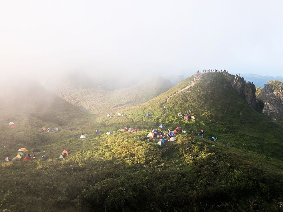 26 Cloud Camp. Photograph by Mc Daniels Cirunay. While awaiting sunrise atop Osmena Peak in Cebu, an island province in the Philippines, Your Shot member Mc Daniels Cirunay saw an opportunity for another photograph. “I was waiting for the sun to come up, but the fog was so thick so I looked the other way and saw this,” he writes. “The fog was moving fast because of the speed of the wind, so I waited for the fog to open up a bit and show something from the camp and the peak.”