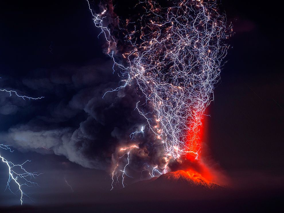 31 The Awakening. Photograph by Francisco Negroni. After nearly five decades of inactivity, the Calbuco volcano in southern Chile spews a violent blast of ash and smoke, the energy generating a tangle of volcanic lightning.