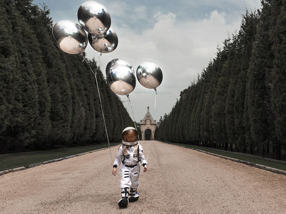 4 Exploring All Avenues. Photograph by Juan Osorio. In Huntington, New York, Your Shot member Juan Osorio’s daughter dreams of a trip that’s out of this world. “[She] wants to fly to the moon,” he writes. “[In this photo], I wanted to create a surreal world with the balloons in which you have several angles of view, like having several cameras showing the landscape and Sophia the astronaut.”