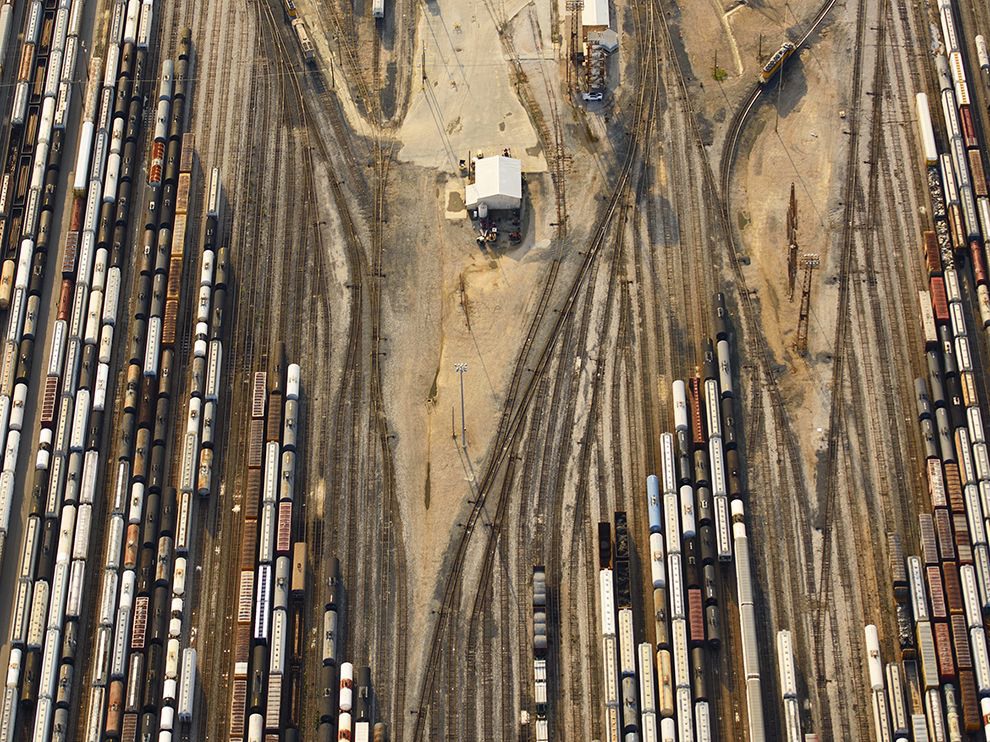 7 Sidelined. Photograph by Jassen T. Stored railroad cars lend pattern and color to a Houston, Texas, rail yard in this aerial image submitted by Your Shot member Jassen T. When the cars are needed, an engineer will use a switch engine to move them into place.