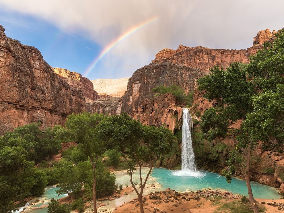 19 Once-in-a-Lifetime View. Photograph by Cory Mottice. A rainbow adds magic to an already paradisiacal scene captured by Your Shot member Cory Mottice at Havasu Falls, Arizona. “The clouds looked promising for a decent sunset, so I left my campsite and headed up to Havasu Falls,” he writes. “Instead, I was treated to a once-in-a-lifetime view.”
