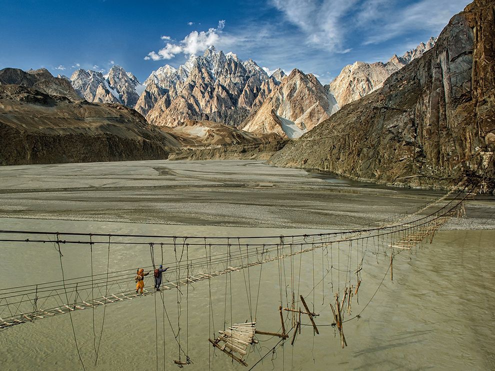 25 By a Thread. Photograph by Kieron Nelson. In northern Pakistan’s Hunza region, travelers cross what’s often called the most dangerous bridge in the world: the Hussaini Hanging Bridge, which looks almost as unforgiving as the landscape around it. “[The bridge] is extremely old and very narrow,” photographer Kieron Nelson writes. “Situated high above [Borit Lake], it is missing many of the original wooden planks.”
