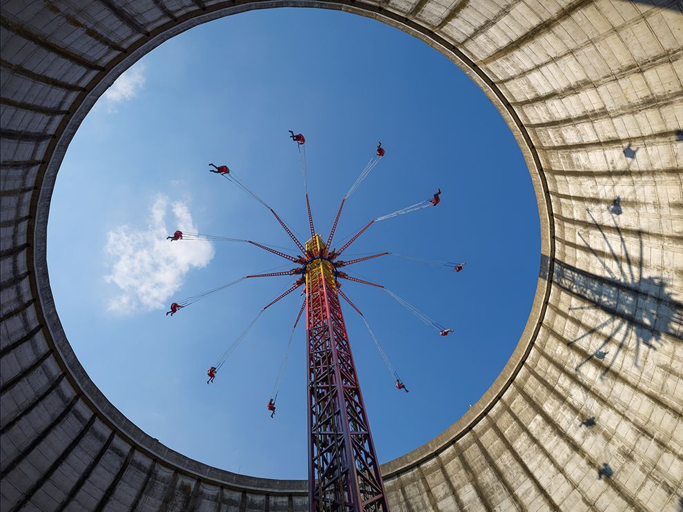 4 Take a Swing. This nuclear reactor at Kalkar, Germany, was finished just before the 1986 explosion at Chernobyl, Ukraine—and never used. It’s now an amusement park with a ride in what would have been the cooling tower. Fear of nuclear power spurred Germany’s transition. Photograph by Luca Locatelli.