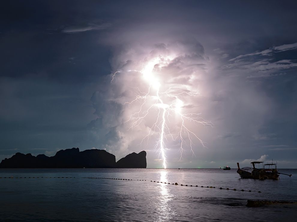 18 "When Lightning Strikes". Photograph by Mike Leske. While on a beach in Thailand’s Hat Noppharat Thara–Mu Ko Phi Phi National Park, Your Shot member Mike Leske received a visual treat.