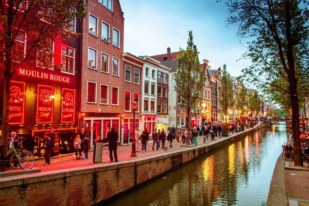 1 De Wallen is the largest and best known red-light district in Amsterdam. Photograph by