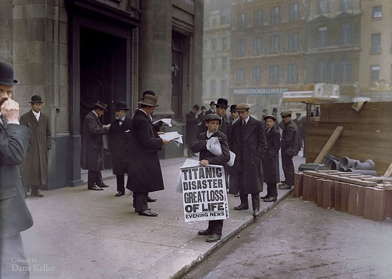15 Small newspaper seller Ned Parfett distributes copies of newspapers reported the shipwreck of the Titanic last night, April 16, 1912. Photograph by Hulton-Deutsch Collection.